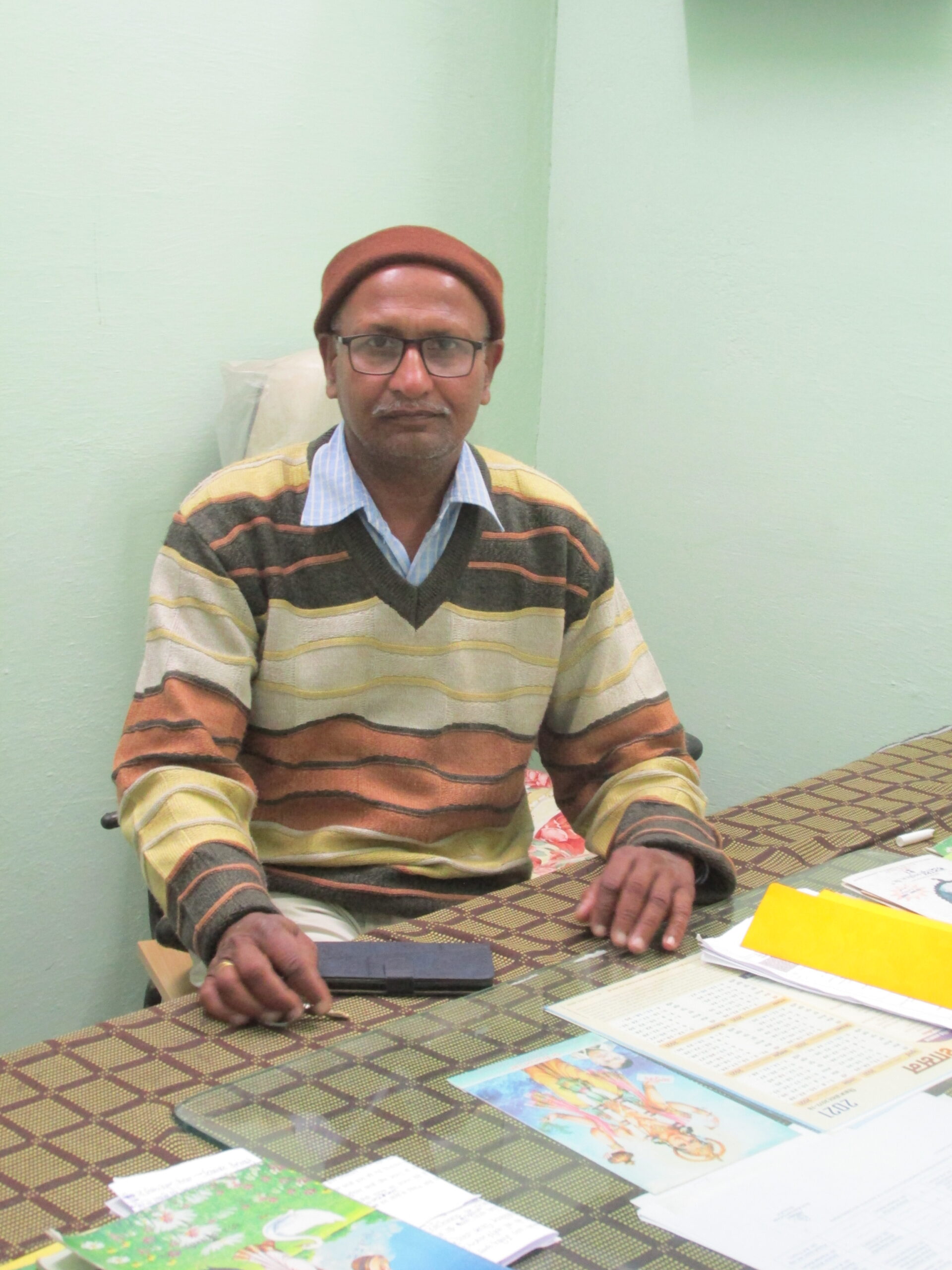 Dr. K.J. Tiwari